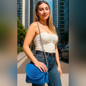 Cream Strapless Top with Blue Knit Bag